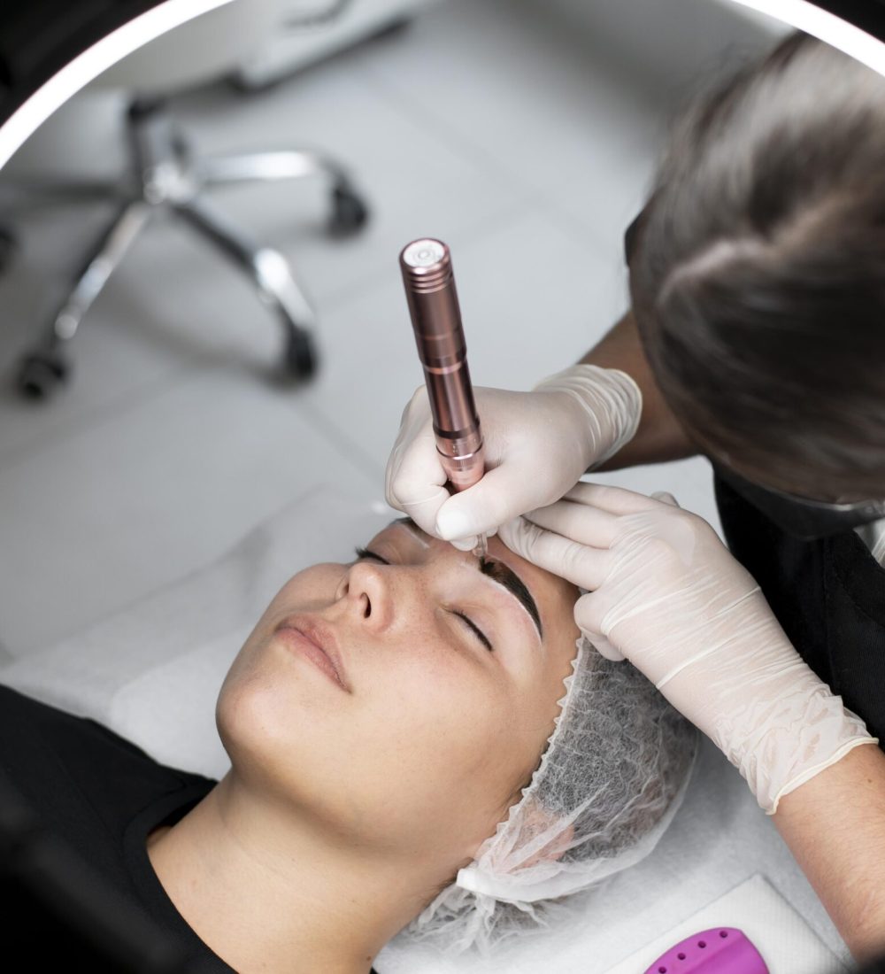 young-woman-going-through-microblading-treatment